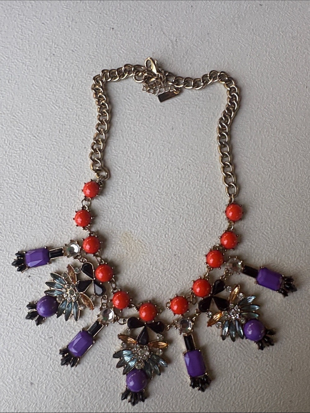 Statement Gold-Tone Necklace with Purple and Coral Accents